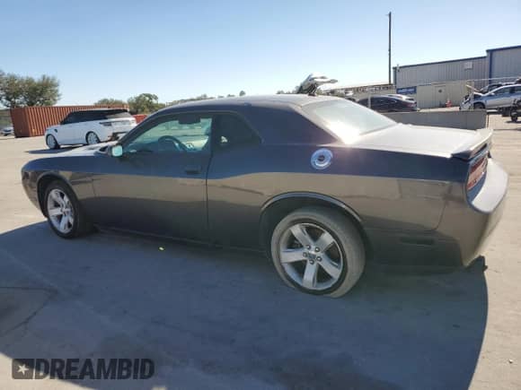 2014 Dodge Challenger R/T 100th Anniversary Appearance z VIN 2C3CDYBT7EH298612, wystawiony jako Copart lot #84862944 z przebiegiem 133 927 mil mil oraz Czysty tytuł • Clean title. Historia ofert i sprzedaży dostępna na DreamBid. Obrazek 2.