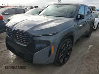 ✅ 2024 BMW XM • VIN: 5YM23CS06R9U92810 • Лот: 75401504. Опубликован ранее на Copart с пробегом 6 181 миль. Бесплатный доступ к архиву аукционных продаж из США и подробный отчёт об истории автомобиля на DreamBid. Изображение 1.