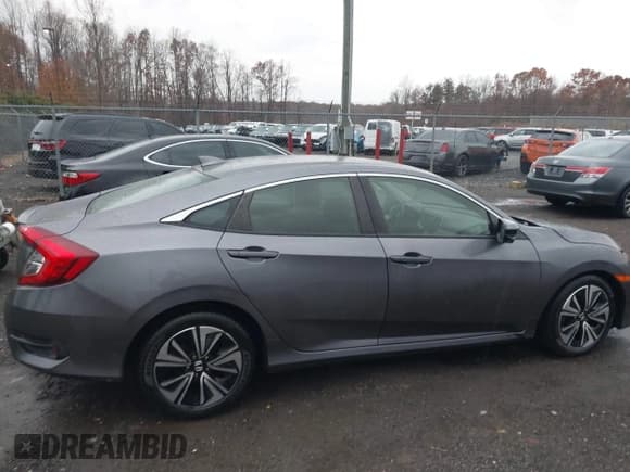 ✅ 2018 Honda Civic EX-T • VIN: JHMFC1F34JX029310 • Lot: 43770255. Listed on IAAI with 71,655 mi. Free auction sales archive from the USA and detailed vehicle history report at DreamBid. Image 13.