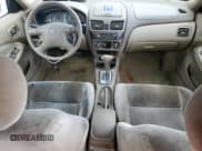 ✅ 2000 Nissan Sentra XE • VIN: 3N1CB51DXYL353143 • Lot: 55061205. Wystawiony na Copart z przebiegiem 145 737 mil. Bezpłatny archiwum sprzedaży aukcyjnych z USA i szczegółowy raport historii pojazdu na DreamBid. Zdjęcie 8.