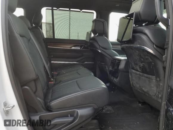 ✅ 2023 Jeep Grand Wagoneer • VIN: 1C4SJVEJ4PS550269 • Lot: 52693175. Listed on Copart with 9,915 mi. Free auction sales archive from the USA and detailed vehicle history report at DreamBid. Image 12.