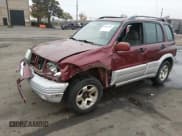 ✅ 2000 Suzuki Grand Vitara JLX • VIN: JS3TD62V9Y4112122 • Lot: 43838714. Listed on IAAI with Not provided. Free auction sales archive from the USA and detailed vehicle history report at DreamBid. Image 2.