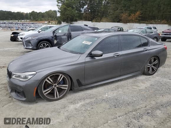 ✅ 2017 BMW 7 Series 750i • VIN: WBA7F0C57HGM21279 • Lot: 90692325. Wystawiony na Copart z przebiegiem 122 955 mil. Bezpłatny archiwum sprzedaży aukcyjnych z USA i szczegółowy raport historii pojazdu na DreamBid. Zdjęcie 1.