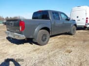 ✅ 2015 Nissan Frontier Pro-4X • VIN: 1N6AD0EV6FN708016 • Lot: 41660814. Listed on IAAI with 86,676 mi. Free auction sales archive from the USA and detailed vehicle history report at DreamBid. Image 4.