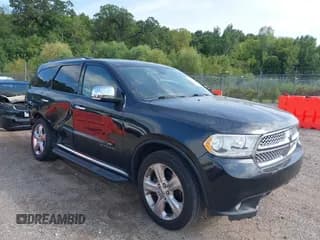 ✅ 2011 Dodge Durango Citadel • VIN: 1D4RE5GG6BC668057 • Lot: 43103584. Listed on IAAI with 162,152 mi. Free auction sales archive from the USA and detailed vehicle history report at DreamBid. Image 1.