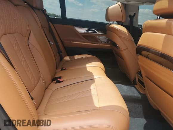 ✅ 2022 BMW 7 Series 740i • VIN: WBA7T2C06NCJ48203 • Лот: 54183325. Опубликован ранее на Copart с пробегом Не указан. Бесплатный доступ к архиву аукционных продаж из США и подробный отчёт об истории автомобиля на DreamBid. Изображение 10.