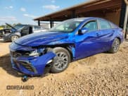 ✅ 2024 Hyundai Elantra Blue • VIN: KMHLM4DJ1RU102467 • Lot: 80209125. Listed on Copart with 21,298 mi. Free auction sales archive from the USA and detailed vehicle history report at DreamBid. Image 1.