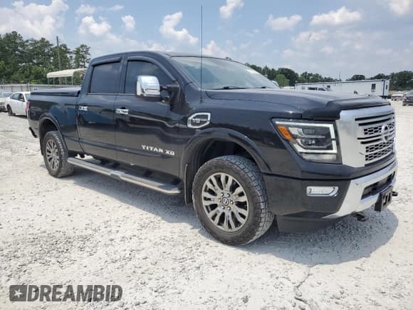 ✅ 2021 Nissan Titan Pro-4X • VIN: 1N6AA1FB8MN531727 • Lot: 62102265. Listed on Copart with 26,668 mi. Free auction sales archive from the USA and detailed vehicle history report at DreamBid. Image 4.