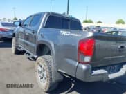 ✅ 2018 Toyota Tacoma TRD Sport • VIN: 3TMAZ5CN7JM066896 • Lot: 43401548. Listed on IAAI with 138,800 mi. Free auction sales archive from the USA and detailed vehicle history report at DreamBid. Image 3.