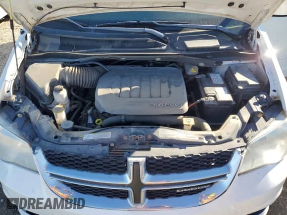 2012 Dodge Grand Caravan SXT z VIN 2C4RDGCG7CR149710, wystawiony jako Copart lot #90794405 z przebiegiem 83 305 mil mil oraz Czysty tytuł • Clean title. Historia ofert i sprzedaży dostępna na DreamBid. Obrazek 12.