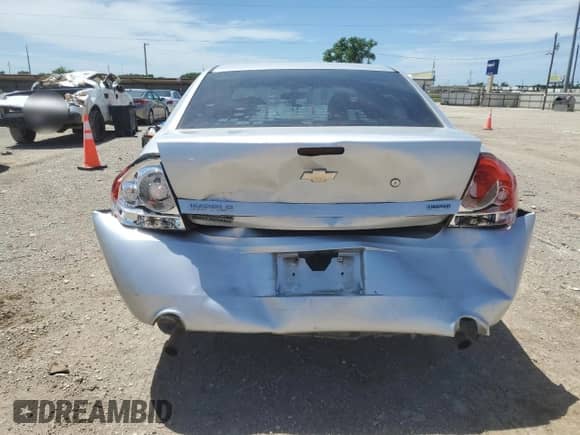 2014 Chevrolet Impala Police Police with VIN 2G1WD5E37E1180502, listed as a Copart auction lot 56597185 with 84,426 mi miles and Salvage title. Bid and sale history available at DreamBid. Image 6.