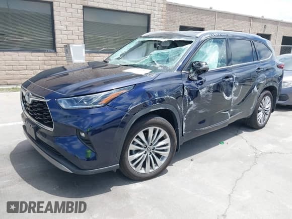 ✅ 2023 Toyota Highlander Hybrid Platinum • VIN: 5TDEBRCH4PS596582 • Lot: 42370587. Listed on IAAI with 12,144 mi. Free auction sales archive from the USA and detailed vehicle history report at DreamBid. Image 2.