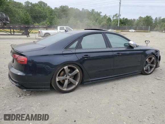 ✅ 2015 Audi S8 • VIN: WAUK2AFD5FN004203 • Lot: 58317975. Listed on Copart with 142,824 mi. Free auction sales archive from the USA and detailed vehicle history report at DreamBid. Image 3.