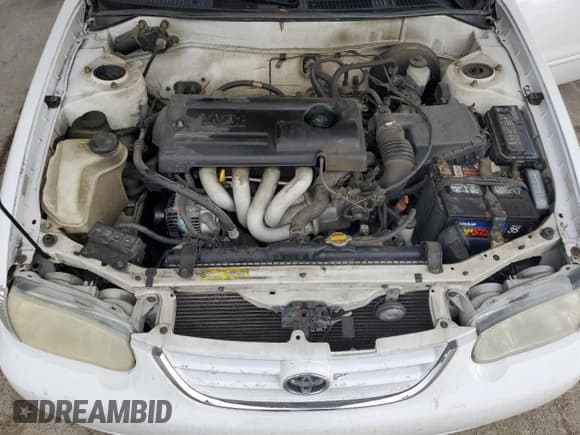 ✅ 2002 Toyota Corolla CE • VIN: 2T1BR12E32C573528 • Lot: 66073844. Listed on Copart with 265,435 mi. Free auction sales archive from the USA and detailed vehicle history report at DreamBid. Image 12.