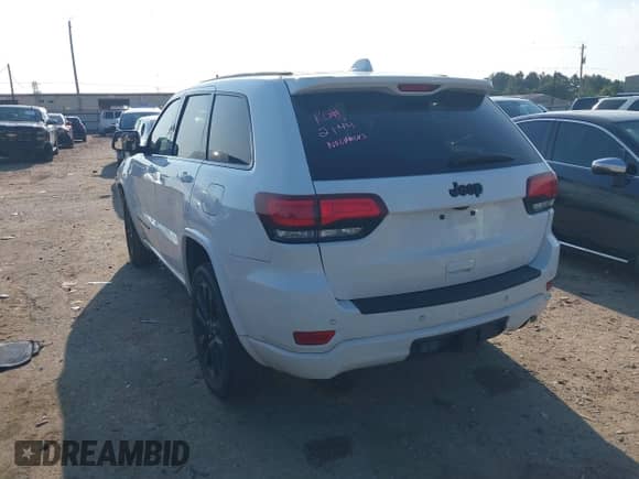 2022 Jeep Grand Cherokee Laredo E with VIN 1C4RJEAGXNC127857, listed as a IAAI auction lot 43202403 with 66,201 mi miles and . Bid and sale history available at DreamBid. Image 3.