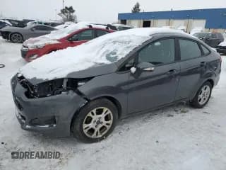 ✅ 2016 Ford Fiesta SE • VIN: 3FADP4BJXGM146803 • Lot: 90866395. Wystawiony na Copart z przebiegiem 86 588 mil. Bezpłatny archiwum sprzedaży aukcyjnych z USA i szczegółowy raport historii pojazdu na DreamBid. Zdjęcie 1.