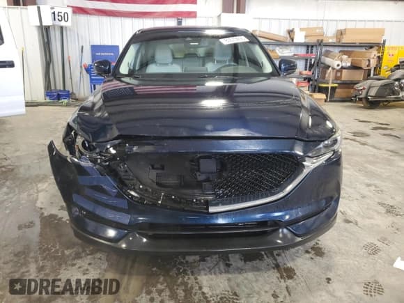 ✅ 2017 Mazda CX-5 Grand Touring • VIN: JM3KFADL2H0143052 • Лот: 85513695. Опубликован ранее на Copart с пробегом 124 826 миль. Бесплатный доступ к архиву аукционных продаж из США и подробный отчёт об истории автомобиля на DreamBid. Изображение 5.