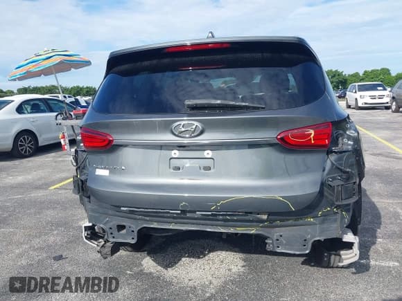 ✅ 2019 Hyundai Santa Fe SE • VIN: 5NMS23AD1KH044131 • Lot: 43237640. Wystawiony na IAAI z przebiegiem 105 619 mil. Bezpłatny archiwum sprzedaży aukcyjnych z USA i szczegółowy raport historii pojazdu na DreamBid. Zdjęcie 17.