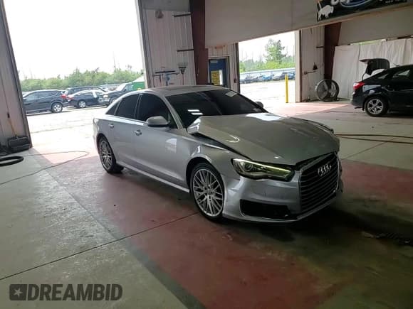✅ 2016 Audi A6 Premium • VIN: WAUFFAFC1GN124742 • Lot: 68173615. Listed on Copart with 115,675 mi. Free auction sales archive from the USA and detailed vehicle history report at DreamBid. Image 13.