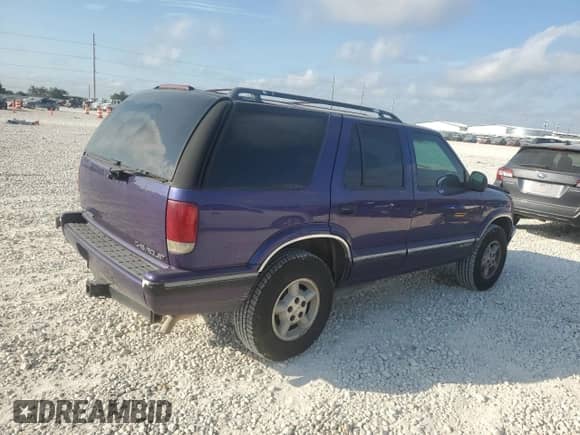 1996 Chevrolet Blazer с VIN 1GNDT13W2T2144616, выставлен на аукционе Copart как лот 72222144 с пробегом 79 574 миль миль и Списание • Salvage title. История ставок и продаж доступна на DreamBid. Изображение 3.