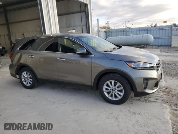 ✅ 2019 Kia Sorento LX • VIN: 5XYPG4A35KG471200 • Лот: 90474615. Опубликован ранее на Copart с пробегом 122 849 миль. Бесплатный доступ к архиву аукционных продаж из США и подробный отчёт об истории автомобиля на DreamBid. Изображение 4.