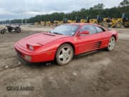 ✅ 1989 Ferrari 348 • VIN: ZFFFA35A8K0082395 • Lot: 70818884. Listed on Copart with 38,978 mi. Free auction sales archive from the USA and detailed vehicle history report at DreamBid. Image 1.
