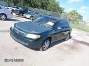 ✅ 2002 Mazda Protege DX • VIN: JM1BJ225X20525208 • Lot: 42746035. Listed on IAAI with Not provided. Free auction sales archive from the USA and detailed vehicle history report at DreamBid. Image 2.