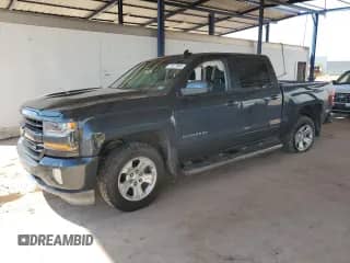 2017 Chevrolet Silverado 1500 LT с VIN 3GCUKREC1HG217647, выставлен на аукционе Copart как лот 71517365 с пробегом 143 100 миль миль и Списание • Salvage title. История ставок и продаж доступна на DreamBid. Изображение 1.