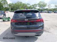 ✅ 2021 Hyundai Santa Fe SE • VIN: 5NMS14AJ0MH332918 • Lot: 42365534. Listed on IAAI with 58,720 mi. Free auction sales archive from the USA and detailed vehicle history report at DreamBid. Image 16.