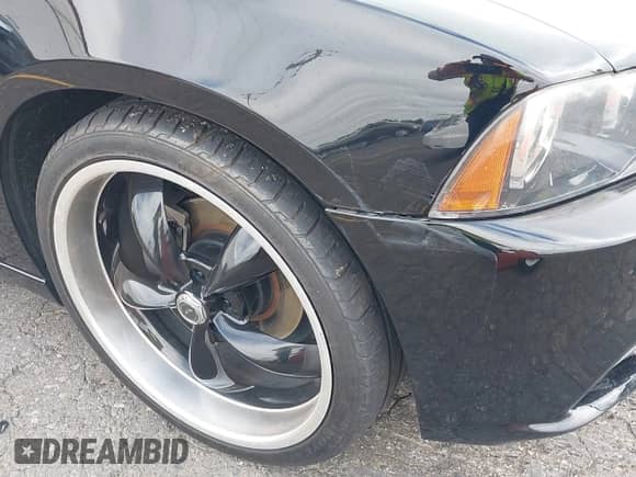 2012 Dodge Charger SXT z VIN 2C3CDXHG6CH248267, wystawiony jako IAAI lot #42836834 z przebiegiem 130 898 mil mil oraz . Historia ofert i sprzedaży dostępna na DreamBid. Obrazek 20.