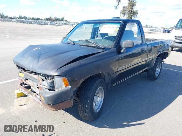 ✅ 1994 Toyota Pickup • VIN: JT4RN81A5R5183586 • Lot: 43734118. Listed on IAAI with 259,243 mi. Free auction sales archive from the USA and detailed vehicle history report at DreamBid. Image 2.