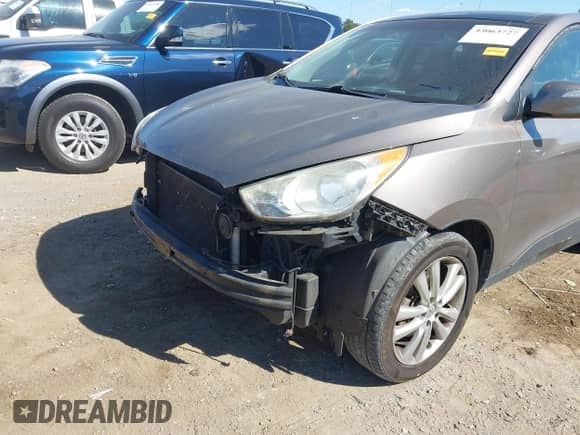 ✅ 2011 Hyundai Tucson Limited • VIN: KM8JUCAC3BU192055 • Lot: 43063727. Listed on IAAI with 214,573 mi. Free auction sales archive from the USA and detailed vehicle history report at DreamBid. Image 6.