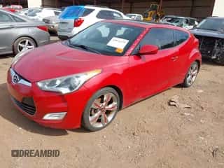 2013 Hyundai Veloster w/Black Int with VIN KMHTC6AD3DU099707, listed as a IAAI auction lot 43076379 with 128,517 mi miles and . Bid and sale history available at DreamBid. Image 2.