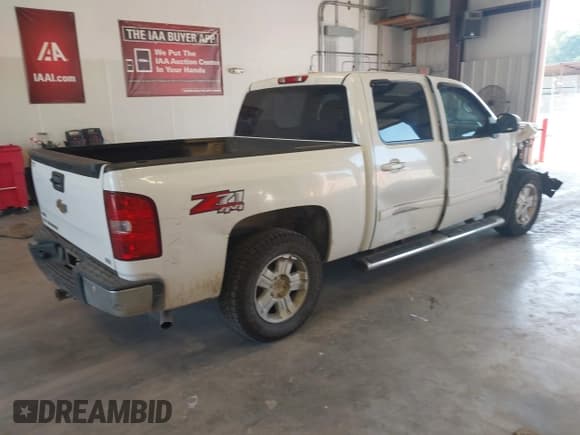 ✅ 2011 Chevrolet Silverado 1500 LTZ • VIN: 3GCPKTE3XBG134686 • Lot: 43311765. Listed on IAAI with 216,205 mi. Free auction sales archive from the USA and detailed vehicle history report at DreamBid. Image 4.
