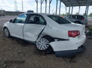 ✅ 2009 Volkswagen Jetta S • VIN: 3VWJM71K09M091585 • Lot: 43140304. Listed on IAAI with 239,628 mi. Free auction sales archive from the USA and detailed vehicle history report at DreamBid. Image 3.