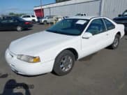 ✅ 1997 Ford Thunderbird LX • VIN: 1FALP62W7VH154412 • Lot: 42157000. Wystawiony na IAAI z przebiegiem 83 965 mil. Bezpłatny archiwum sprzedaży aukcyjnych z USA i szczegółowy raport historii pojazdu na DreamBid. Zdjęcie 17.
