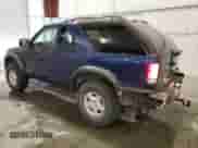 1999 Chevrolet Blazer LS z VIN 1GNCT18W9XK157387, wystawiony jako Copart lot #49667765 z przebiegiem 182 411 mil mil oraz Szkoda całkowita • Salvage title. Historia ofert i sprzedaży dostępna na DreamBid. Obrazek 2.