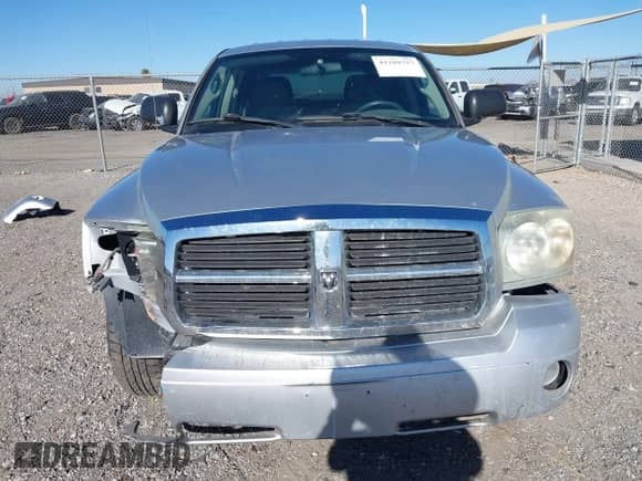 2006 Dodge Dakota SLT with VIN 1D7HE48N46S556925, listed as a IAAI auction lot 41169757 with 158,667 mi miles and . Bid and sale history available at DreamBid. Image 12.