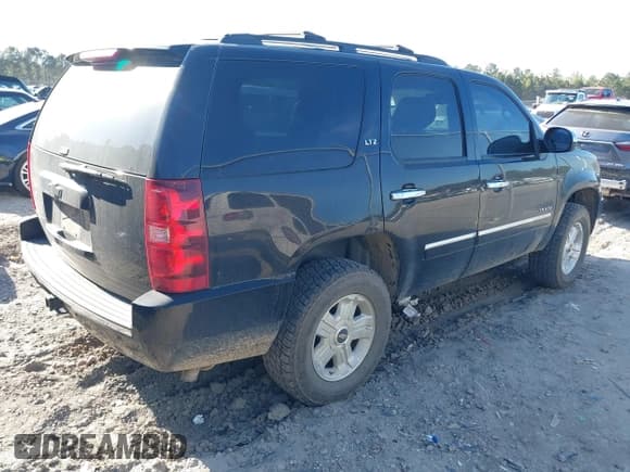 ✅ 2013 Chevrolet Tahoe LTZ • VIN: 1GNSCCE07DR169385 • Lot: 41899972. Listed on IAAI with 132,005 mi. Free auction sales archive from the USA and detailed vehicle history report at DreamBid. Image 4.