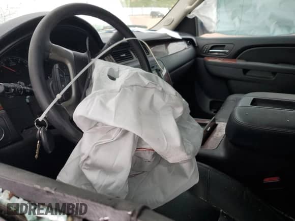 2013 Chevrolet Tahoe LTZ z VIN 1GNSKCE08DR270891, wystawiony jako Copart lot #80282665 z przebiegiem Nie podano mil oraz Nie do naprawy • Non repairable. Historia ofert i sprzedaży dostępna na DreamBid. Obrazek 8.