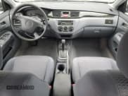 ✅ 2002 Mitsubishi Lancer ES • VIN: JA3AJ26E82U021334 • Лот: 93683005. Опубликован ранее на Copart с пробегом 67 288 миль. Бесплатный доступ к архиву аукционных продаж из США и подробный отчёт об истории автомобиля на DreamBid. Изображение 8.