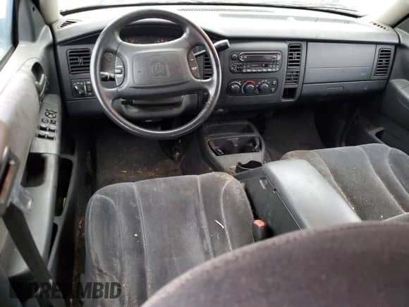 2004 Dodge Dakota SLT z VIN 1D7HG48K64S556101, wystawiony jako Copart lot #83773434 z przebiegiem Nie podano mil oraz Nie do naprawy • Non repairable. Historia ofert i sprzedaży dostępna na DreamBid. Obrazek 8.