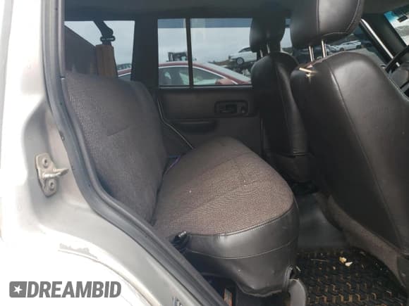 ✅ 2001 Jeep Cherokee Limited • VIN: 1J4FT58S21L513815 • Lot: 79810754. Listed on Copart with 248,712 mi. Free auction sales archive from the USA and detailed vehicle history report at DreamBid. Image 11.