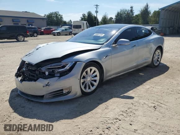 ✅ 2017 Tesla Model S 60 • VIN: 5YJSA1E13HF196994 • Lot: 80881205. Wystawiony na Copart z przebiegiem 162 169 mil. Bezpłatny archiwum sprzedaży aukcyjnych z USA i szczegółowy raport historii pojazdu na DreamBid. Zdjęcie 1.