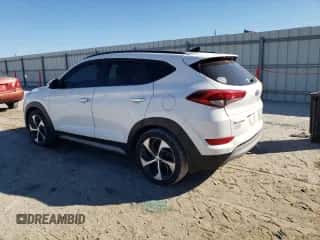 2018 Hyundai Tucson Value z VIN KM8J33A22JU645218, wystawiony jako Copart lot #90871735 z przebiegiem 137 400 mil mil oraz Czysty tytuł • Clean title. Historia ofert i sprzedaży dostępna na DreamBid. Obrazek 2.