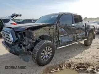 ✅ 2023 Toyota Tacoma Limited • VIN: 3TMEZ5CN7PM204446 • Лот: 67068615. Опубликован ранее на Copart с пробегом 43 738 миль. Бесплатный доступ к архиву аукционных продаж из США и подробный отчёт об истории автомобиля на DreamBid. Изображение 1.