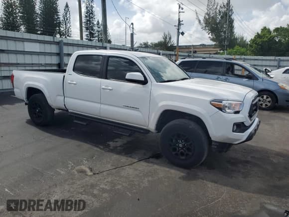 ✅ 2021 Toyota Tacoma SR5 • VIN: 3TMBZ5DN2MM031559 • Lot: 57550445. Listed on Copart with 38,025 mi. Free auction sales archive from the USA and detailed vehicle history report at DreamBid. Image 4.