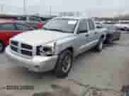 2007 Dodge Dakota SLT with VIN 1D7HW48K77S129162, listed as a IAAI auction lot 41842077 with 186,172 mi miles and . Bid and sale history available at DreamBid. Image 2.