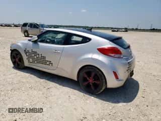 2013 Hyundai Veloster w/Black Int with VIN KMHTC6AD9DU147646, listed as a Copart auction lot 58495585 with 121,781 mi miles and Salvage title. Bid and sale history available at DreamBid. Image 2.