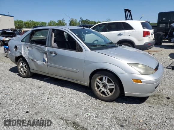 ✅ 2004 Ford Focus SE • VIN: 1FAFP34ZX4W120445 • Лот: 52670125. Опубликован ранее на Copart с пробегом 177 911 миль. Бесплатный доступ к архиву аукционных продаж из США и подробный отчёт об истории автомобиля на DreamBid. Изображение 4.